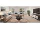 Living room with comfortable seating and built-in shelving at 660 Edgar St # 158, Hampton, GA 30228