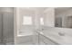 Bathroom with soaking tub, double vanity, and shower at 660 Edgar St # 158, Hampton, GA 30228