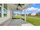 Covered patio with ceiling fans, overlooking backyard at 660 Edgar St # 158, Hampton, GA 30228