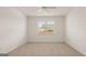 Spacious bedroom with neutral carpeting and ceiling fan at 660 Edgar St # 158, Hampton, GA 30228