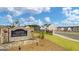 Community entrance with stone signage and landscaping at 660 Edgar St # 158, Hampton, GA 30228