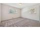 Bright bedroom with carpet, dual windows and overhead lighting at 1785 Enid Dr, Lithonia, GA 30058