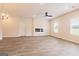 Bright living room featuring a fireplace and wood-look floors at 211 Fern Dale Drive Dr # 120, Fairburn, GA 30213