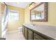 Bathroom boasts a tiled shower, updated vanity, and large mirror at 9465 River Lake Dr, Roswell, GA 30075