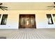Antique wooden front door with oval glass panels at 1471 Centennial Rd, Rutledge, GA 30663