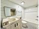 Bathroom with white subway tile and a vintage vanity at 1471 Centennial Rd, Rutledge, GA 30663