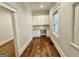 Bright office with built-in cabinetry and hardwood floors at 1471 Centennial Rd, Rutledge, GA 30663