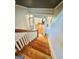 View down the staircase to the main floor at 1471 Centennial Rd, Rutledge, GA 30663