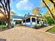 Charming white farmhouse features a long driveway and spacious porch at 1471 Centennial Rd, Rutledge, GA 30663