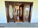 Open antique front door revealing the home's interior at 1471 Centennial Rd, Rutledge, GA 30663