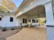 View of the home's exterior and covered porch area at 1471 Centennial Rd, Rutledge, GA 30663