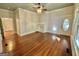 Living room with hardwood floors, fireplace, and French doors at 1471 Centennial Rd, Rutledge, GA 30663
