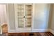 White built-in shelving unit with glass doors at 1471 Centennial Rd, Rutledge, GA 30663
