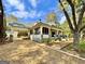 Stunning house with a large front porch and a long driveway at 1471 Centennial Rd, Rutledge, GA 30663