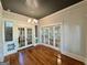 Bright entryway with hardwood floors, and french doors at 1471 Centennial Rd, Rutledge, GA 30663