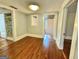 Upper hallway with hardwood floors and access to other rooms at 1471 Centennial Rd, Rutledge, GA 30663