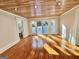Living room with hardwood floors and access to deck at 1471 Centennial Rd, Rutledge, GA 30663