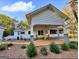 Covered porch with grey columns and exterior access to the home at 1471 Centennial Rd, Rutledge, GA 30663
