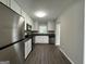 Modern kitchen with stainless steel appliances and granite countertops at 2164 Rockhaven Cir, Decatur, GA 30032