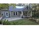 Exterior of a charming two-story home with a front porch at 6851 Queen Mill Se Rd, Mableton, GA 30126
