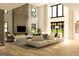 Modern living room featuring a linear fireplace and large windows at 280 Brannan Rd, Mcdonough, GA 30253