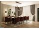 Modern dining room with a large table, statement lighting, and stylish decor at 280 Brannan Rd, Mcdonough, GA 30253