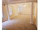 Spacious main bedroom with carpeted floor and ceiling fan at 1402 Aramore Se Dr, Conyers, GA 30013