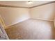 Well-lit bedroom with carpet flooring and neutral walls at 1402 Aramore Se Dr, Conyers, GA 30013