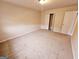 Bright bedroom with carpet flooring and closet at 1402 Aramore Se Dr, Conyers, GA 30013