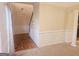 Hardwood floors and wainscoting in entry hall at 1402 Aramore Se Dr, Conyers, GA 30013