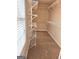 Large walk-in closet with wire shelving and hanging rods at 1402 Aramore Se Dr, Conyers, GA 30013