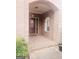 Brick front porch with a charming wood door welcomes you home at 1402 Aramore Se Dr, Conyers, GA 30013