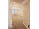 Spacious carpeted bedroom with ceiling fan at 1402 Aramore Se Dr, Conyers, GA 30013