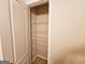 Walk-in closet with wire shelving at 1402 Aramore Se Dr, Conyers, GA 30013