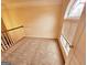 Open loft area with window and carpet flooring at 1402 Aramore Se Dr, Conyers, GA 30013