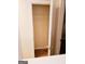 Walk-in closet with wood flooring and hanging rod at 1402 Aramore Se Dr, Conyers, GA 30013
