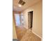 Hallway with carpet and doors leading to bedrooms and bathroom at 1402 Aramore Se Dr, Conyers, GA 30013
