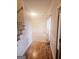 Hardwood floors in entry hall, leading to living room at 1402 Aramore Se Dr, Conyers, GA 30013