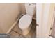 Small bathroom with a toilet and tile flooring at 1402 Aramore Se Dr, Conyers, GA 30013