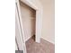 Built-in closet with wire shelving and hanging rod at 1402 Aramore Se Dr, Conyers, GA 30013