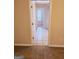 View of a bathroom with tile flooring and access to other rooms at 1402 Aramore Se Dr, Conyers, GA 30013