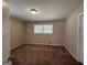 Bright bedroom featuring neutral walls and carpeting at 3107 Cherry Blossom Ln, East Point, GA 30344