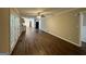 Spacious living area with hardwood floors and French doors leading to patio at 3107 Cherry Blossom Ln, East Point, GA 30344