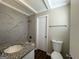 Clean bathroom with granite countertop and updated fixtures at 3107 Cherry Blossom Ln, East Point, GA 30344