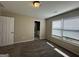 Bedroom with carpet, double-door closet and a view of the bathroom at 150 Turman Se Ave, Atlanta, GA 30315