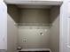 Laundry closet with wire shelving and space for washer and dryer at 150 Turman Se Ave, Atlanta, GA 30315