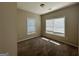 Bright bedroom with carpeted floor and two large windows at 150 Turman Se Ave, Atlanta, GA 30315