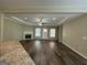 Living Room with hardwood floors, fireplace, and large windows at 150 Turman Se Ave, Atlanta, GA 30315