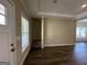 Entryway with hardwood floors, stairs, and a window with blinds at 150 Turman Se Ave, Atlanta, GA 30315