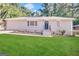 Ranch style home with a well-manicured lawn at 2530 Habersham Dr, Decatur, GA 30032